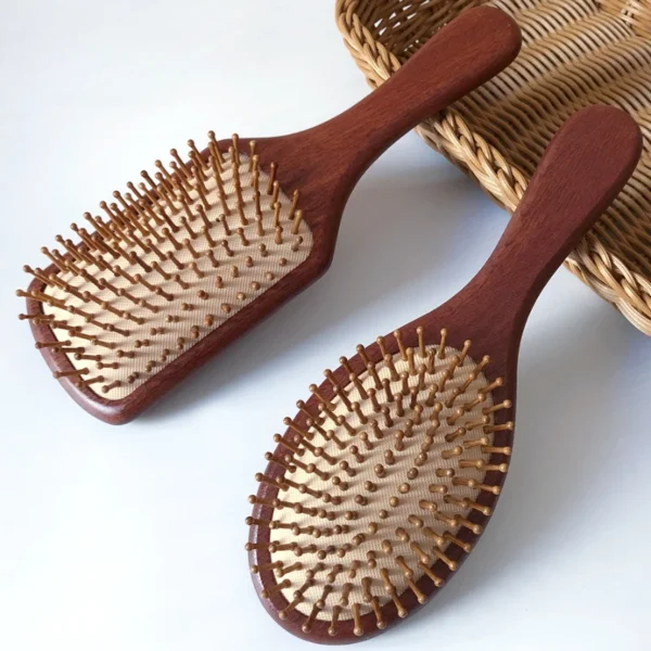 Wooden hair brush with steel needles for scalp care and massage